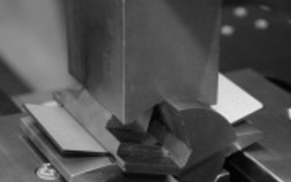 Biegen unter radialer Druckspannung